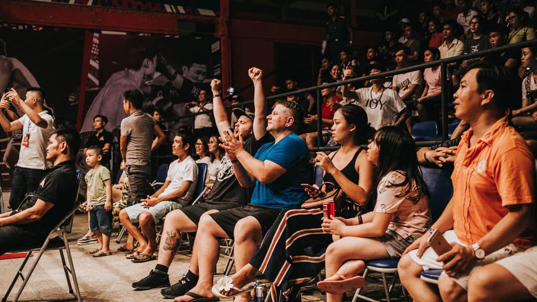 Audience in air conditioned auditorium