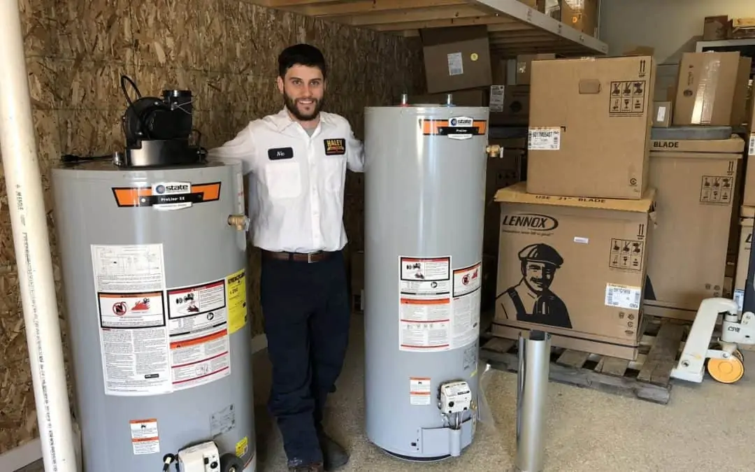 Nick O'Neil Demonstrating the difference between water heater types